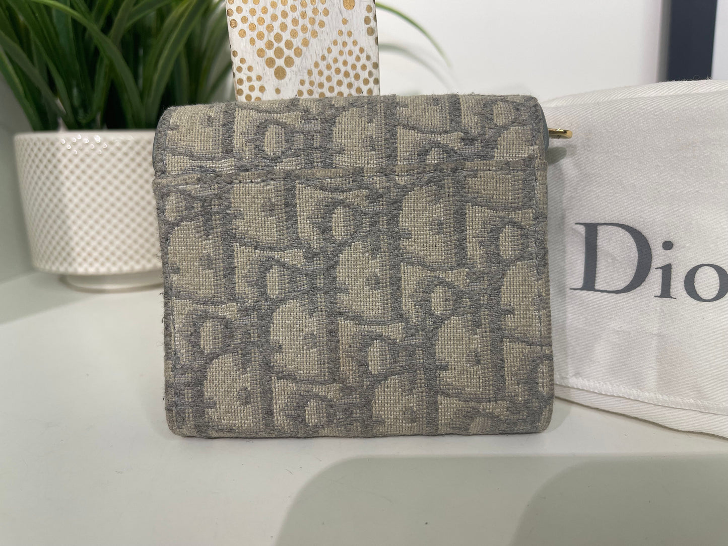 80. Christian Dior Oblique Saddle Lotus Trifold Wallet