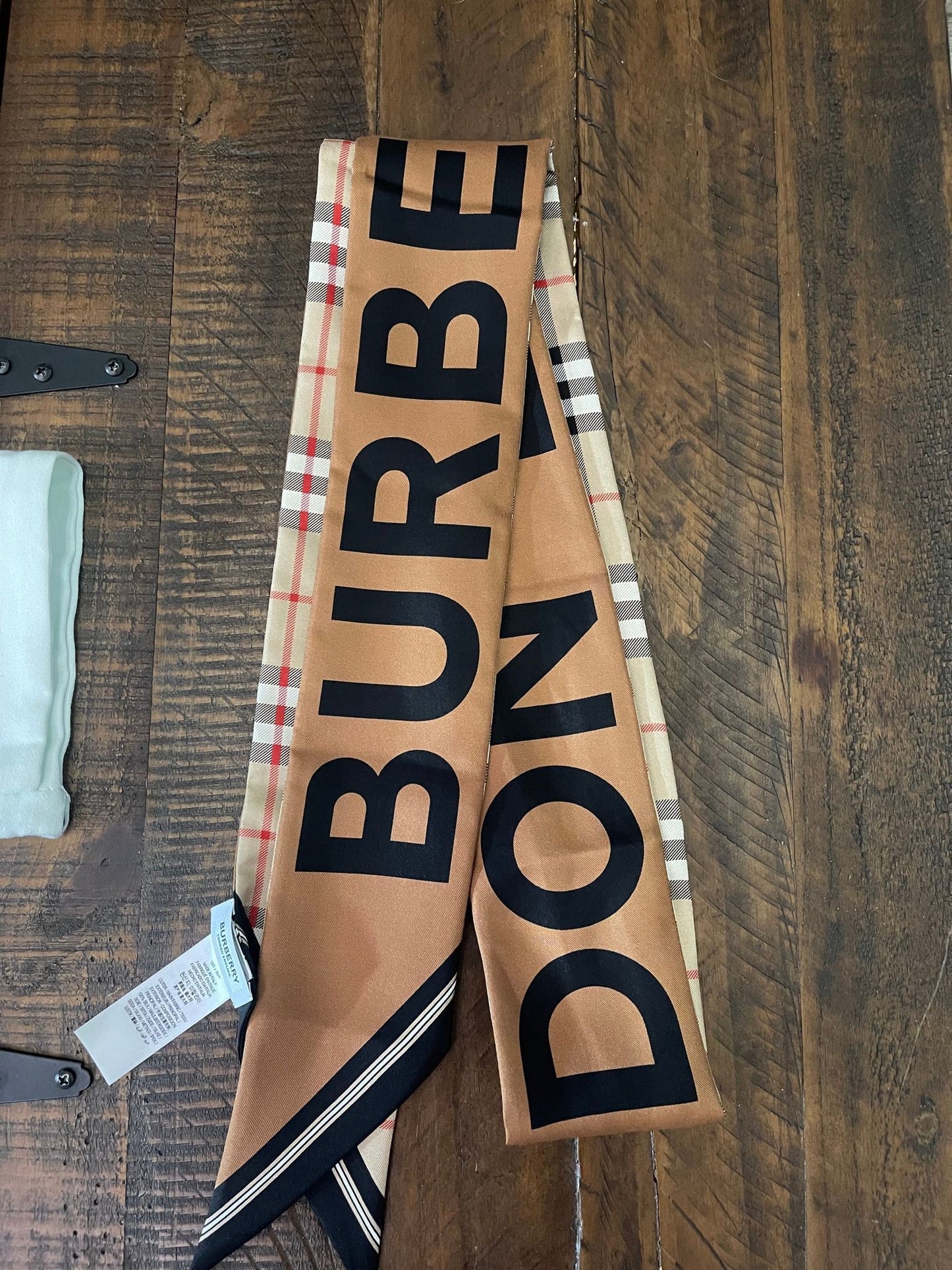 100. Burberry Silk Scarf