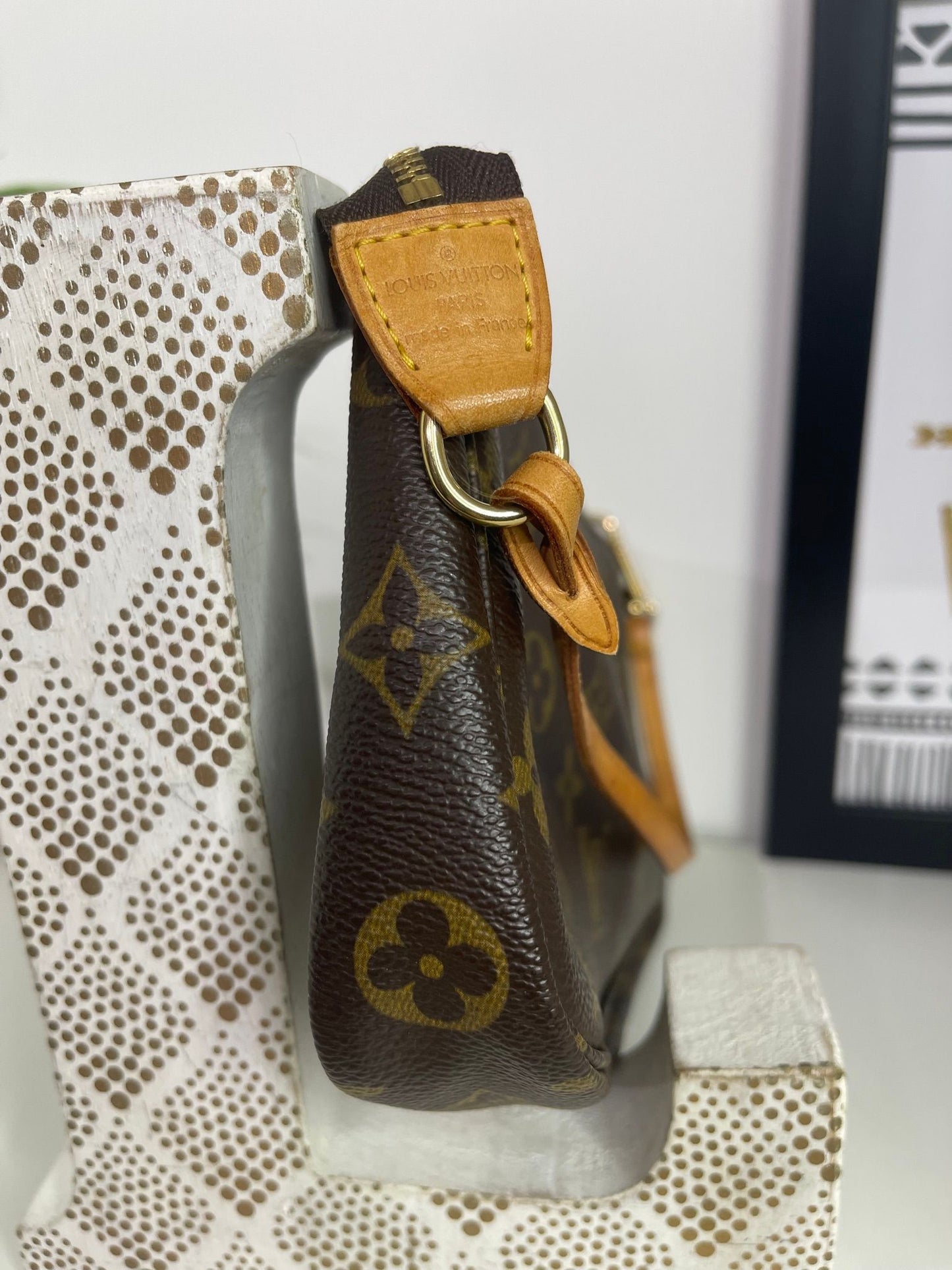 71. Louis Vuitton Monogram Pouchette