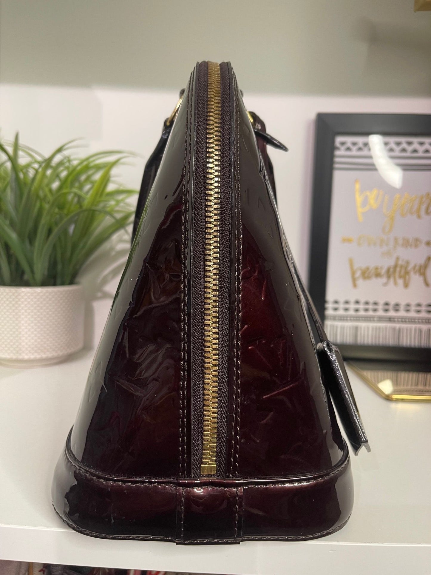 130. Louis Vuitton Vernis Amarante Alma PM