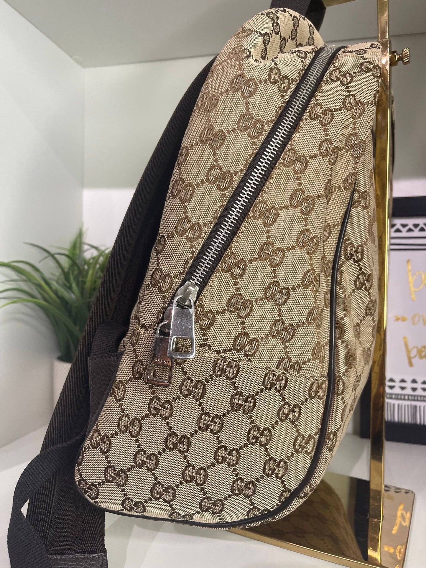 103. Gucci Canvas Backpack