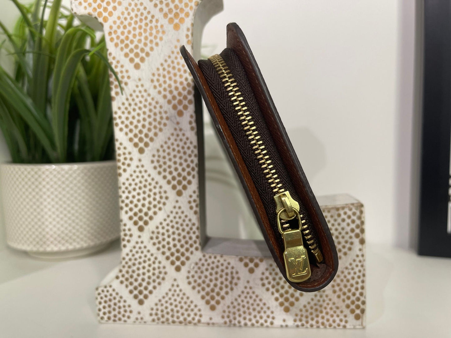 120. Louis Vuitton Monogram Porte Monnaie Zip Wallet
