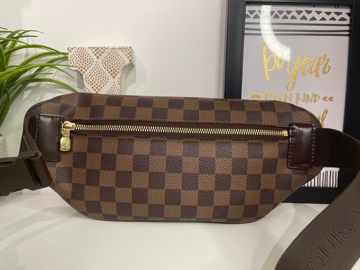 21. Louis Vuitton Damier Ebene Melville Bumbag