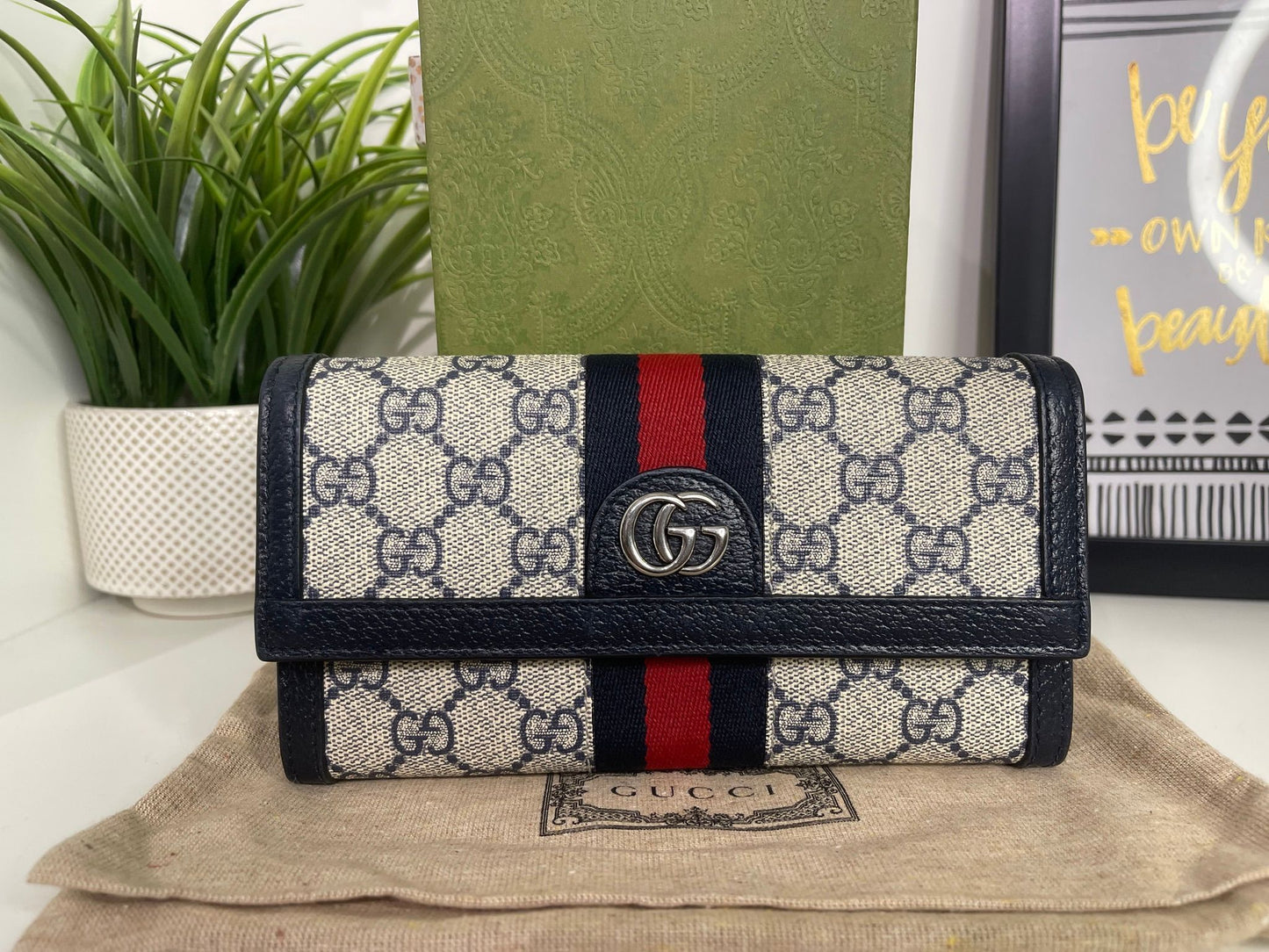 117. Gucci Supreme Navy Long Wallet