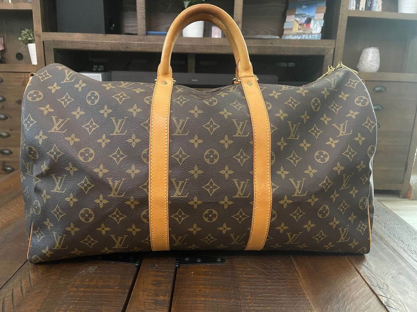 38. Louis Vuitton KeepAll 50 Bandolier (NO STRAP)