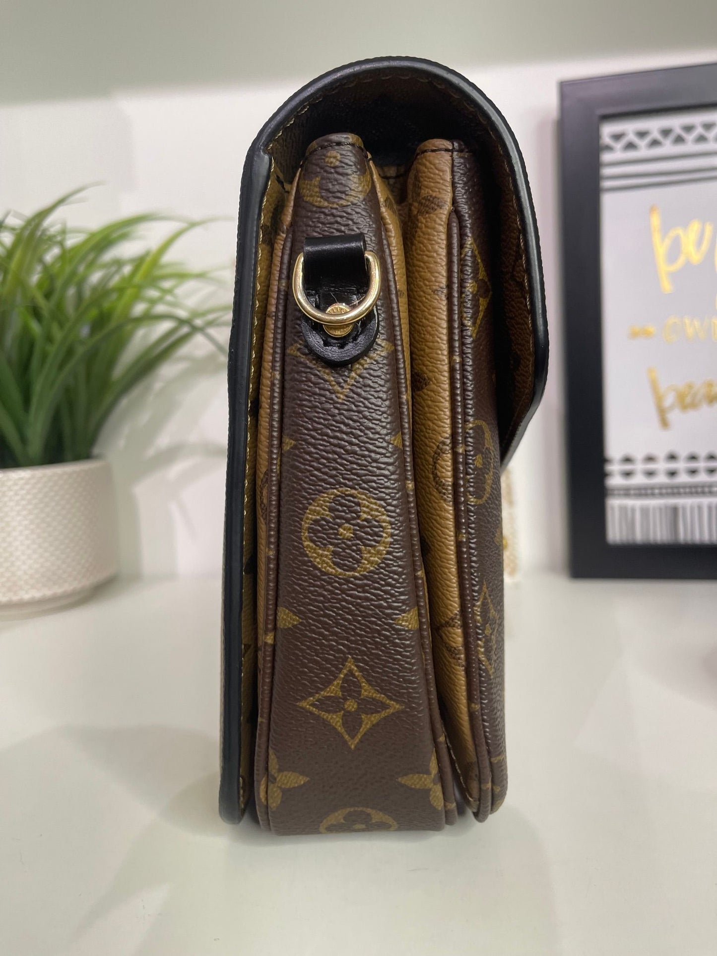 94. Louis Vuitton Reverse Monogram Pouchette Metis