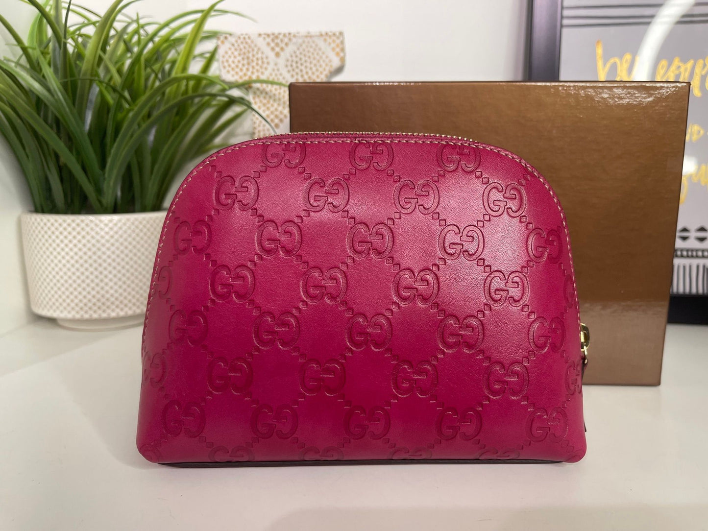121. Gucci Fuscia Cosmetic Bag