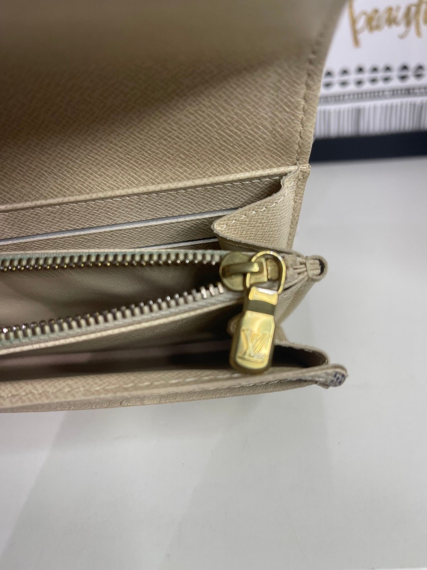 32. Louis Vuitton Damier Azur Sarah Wallet