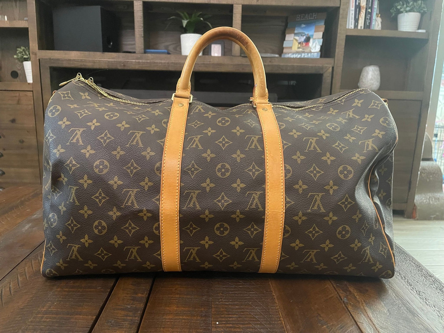 38. Louis Vuitton KeepAll 50 Bandolier (NO STRAP)