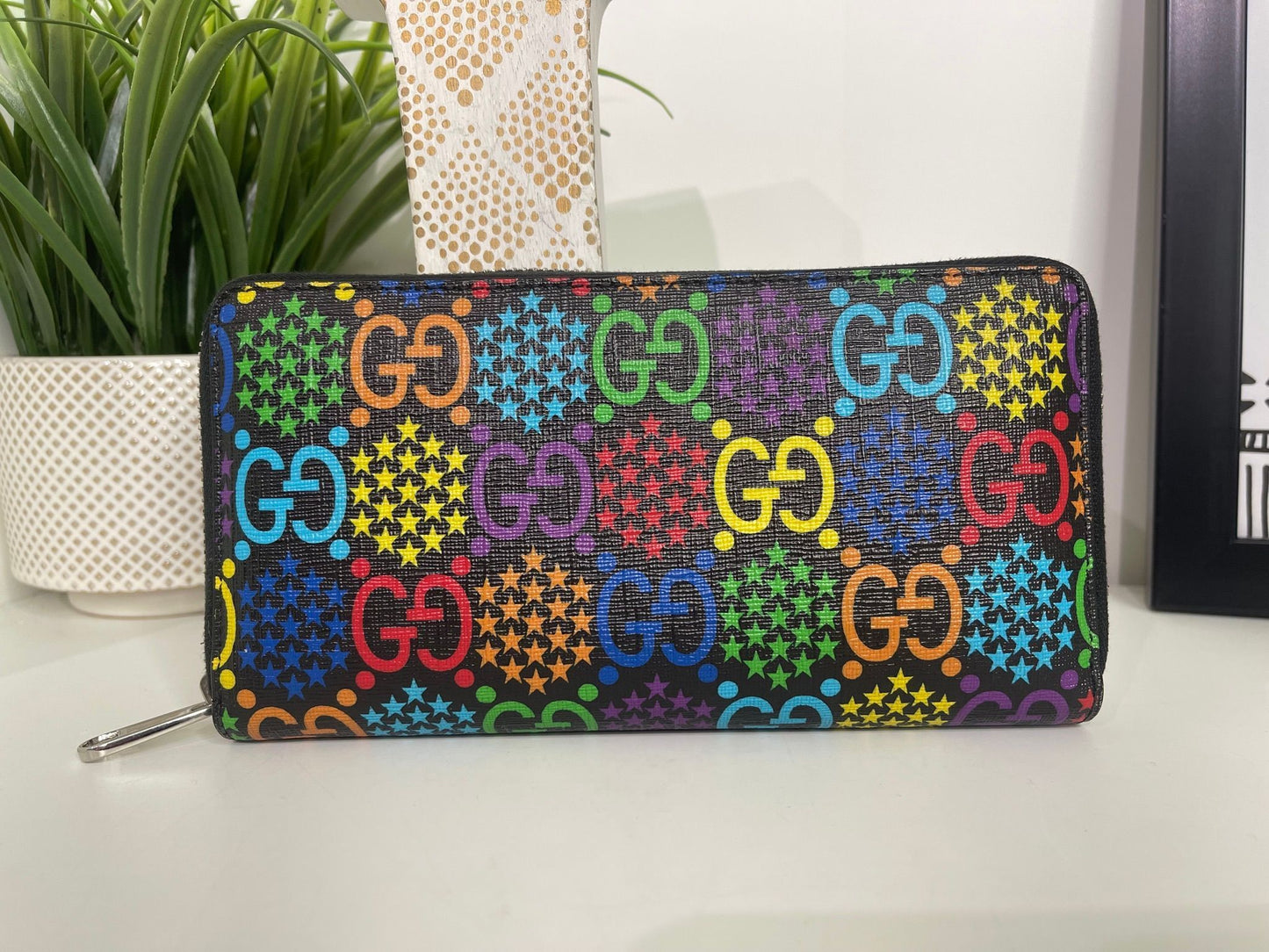 86. Gucci Psychedelic Zippy Wallet