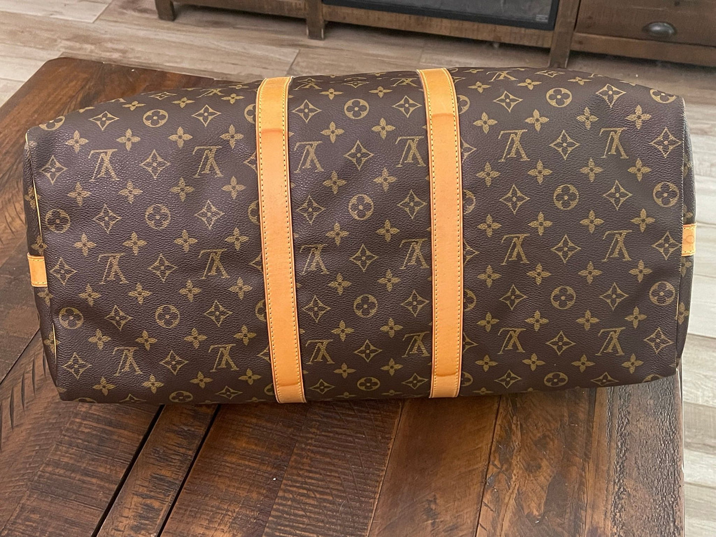 38. Louis Vuitton KeepAll 50 Bandolier (NO STRAP)