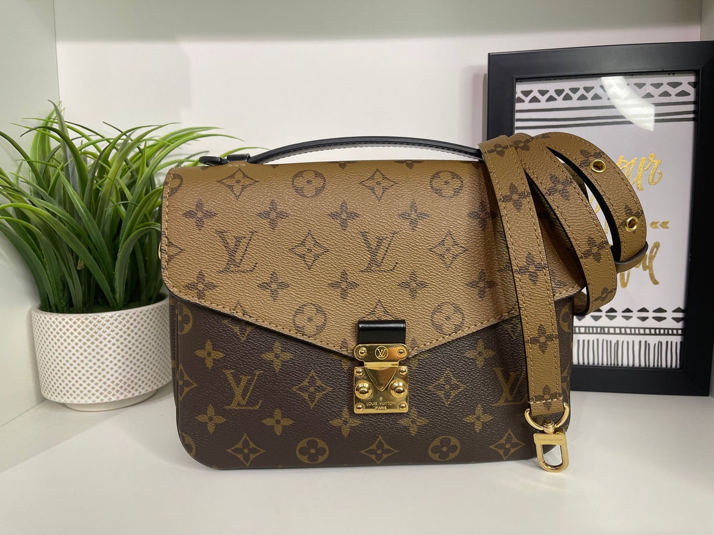 94. Louis Vuitton Reverse Monogram Pouchette Metis