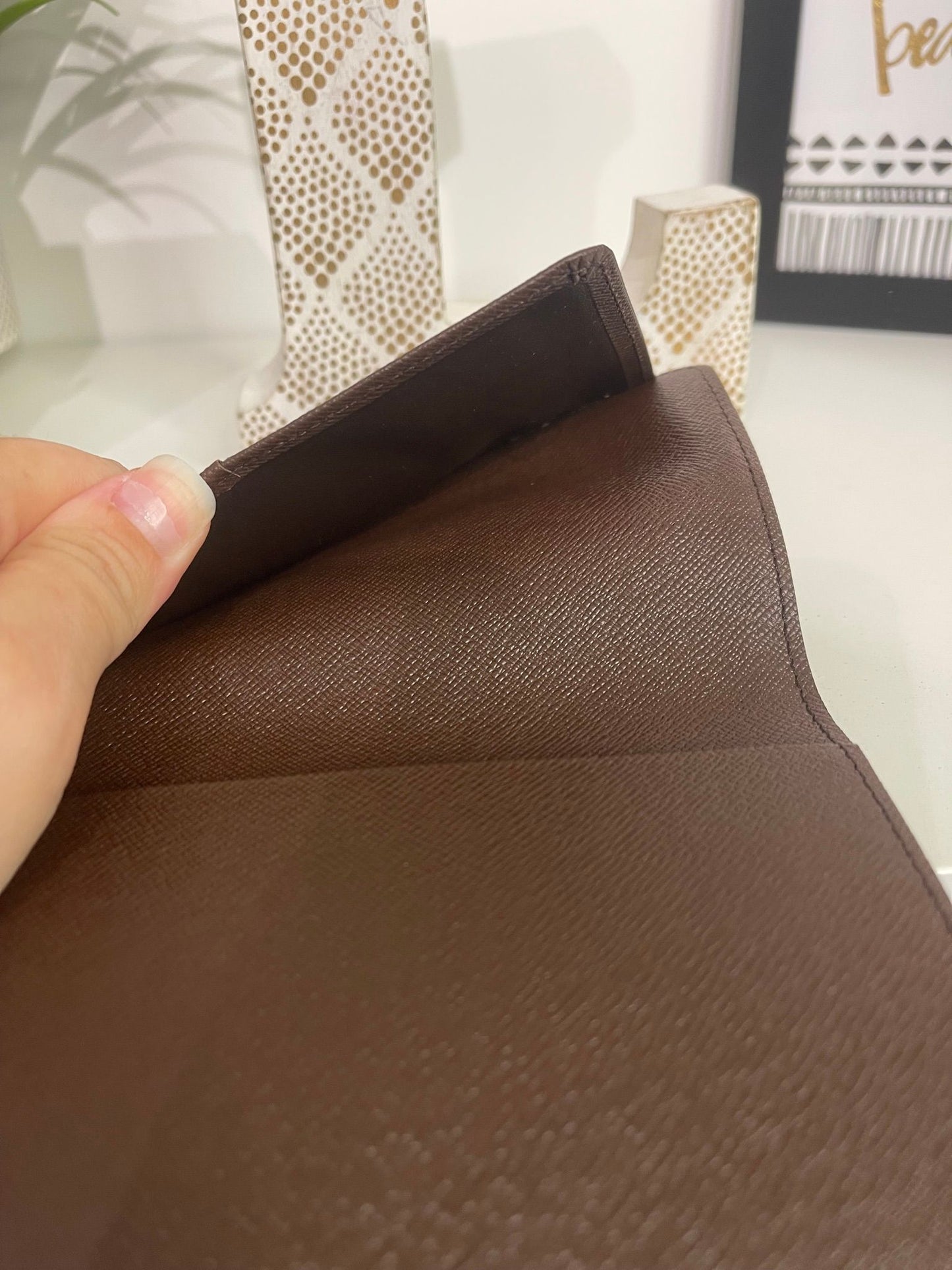 18. Louis Vuitton Damier Ebene Passport Holder