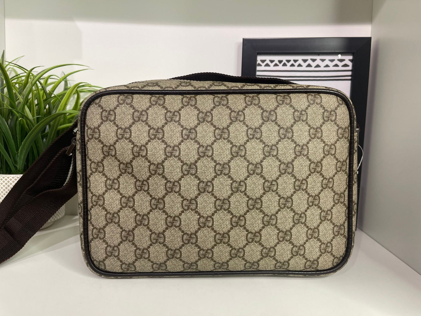 49. Gucci Supreme Crossbody Camera Bag