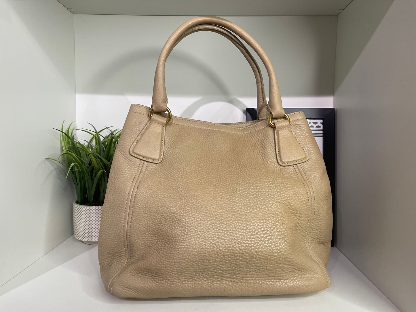 44. Prada Beige Hobo Bag