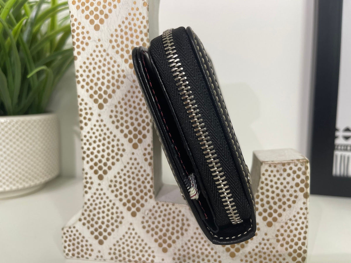 90. Burberry Blue Label Compact Wallet