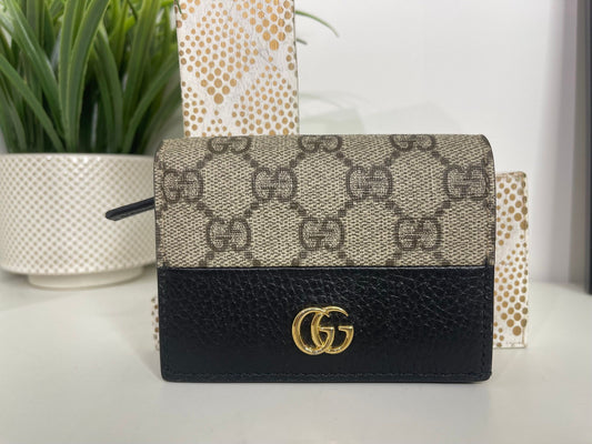 76. Gucci Supreme Compact Wallet Black Leather Trim