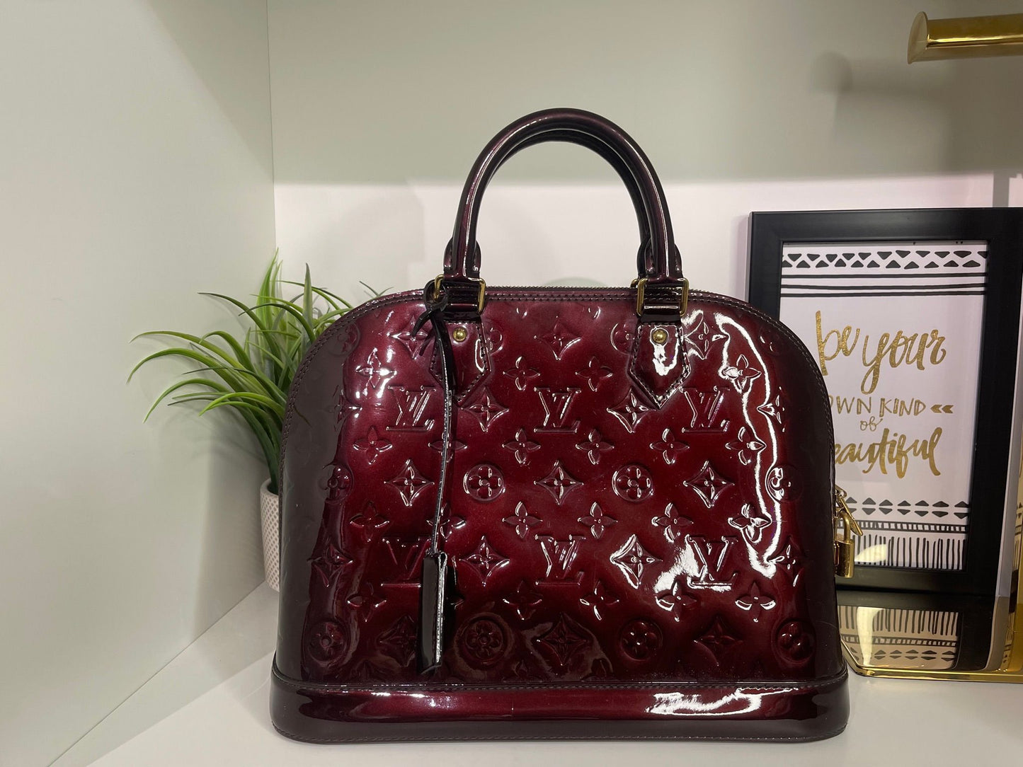 130. Louis Vuitton Vernis Amarante Alma PM