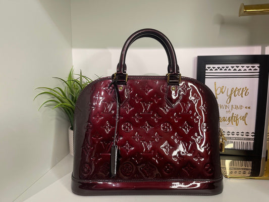 130. Louis Vuitton Vernis Amarante Alma PM