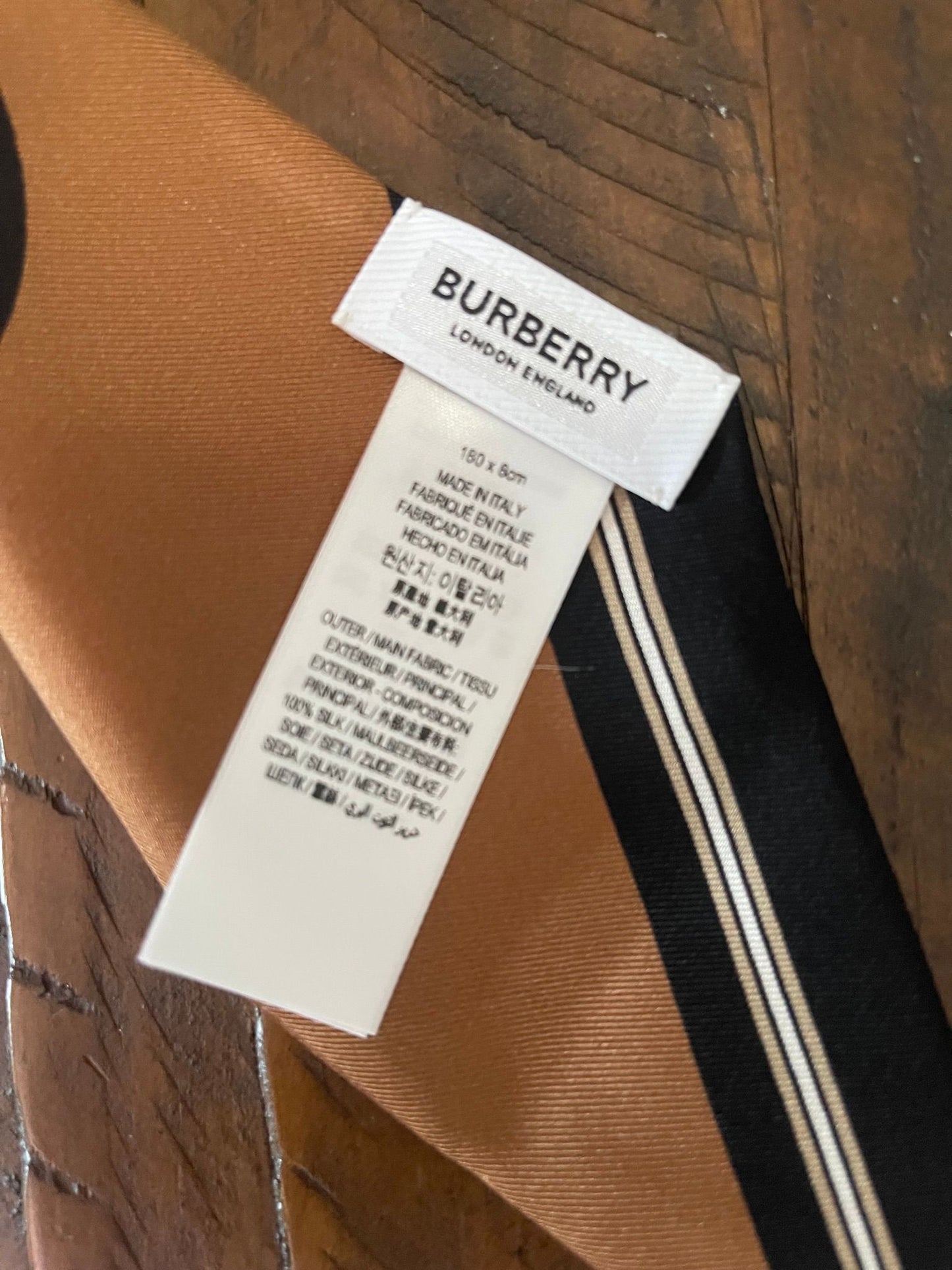100. Burberry Silk Scarf