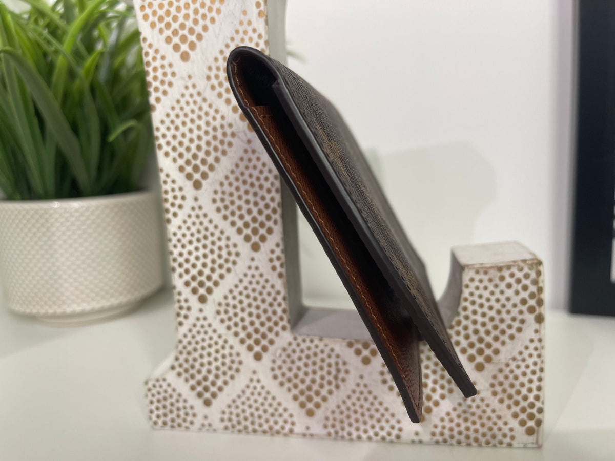 84. Louis Vuitton Monogram Passport Cover