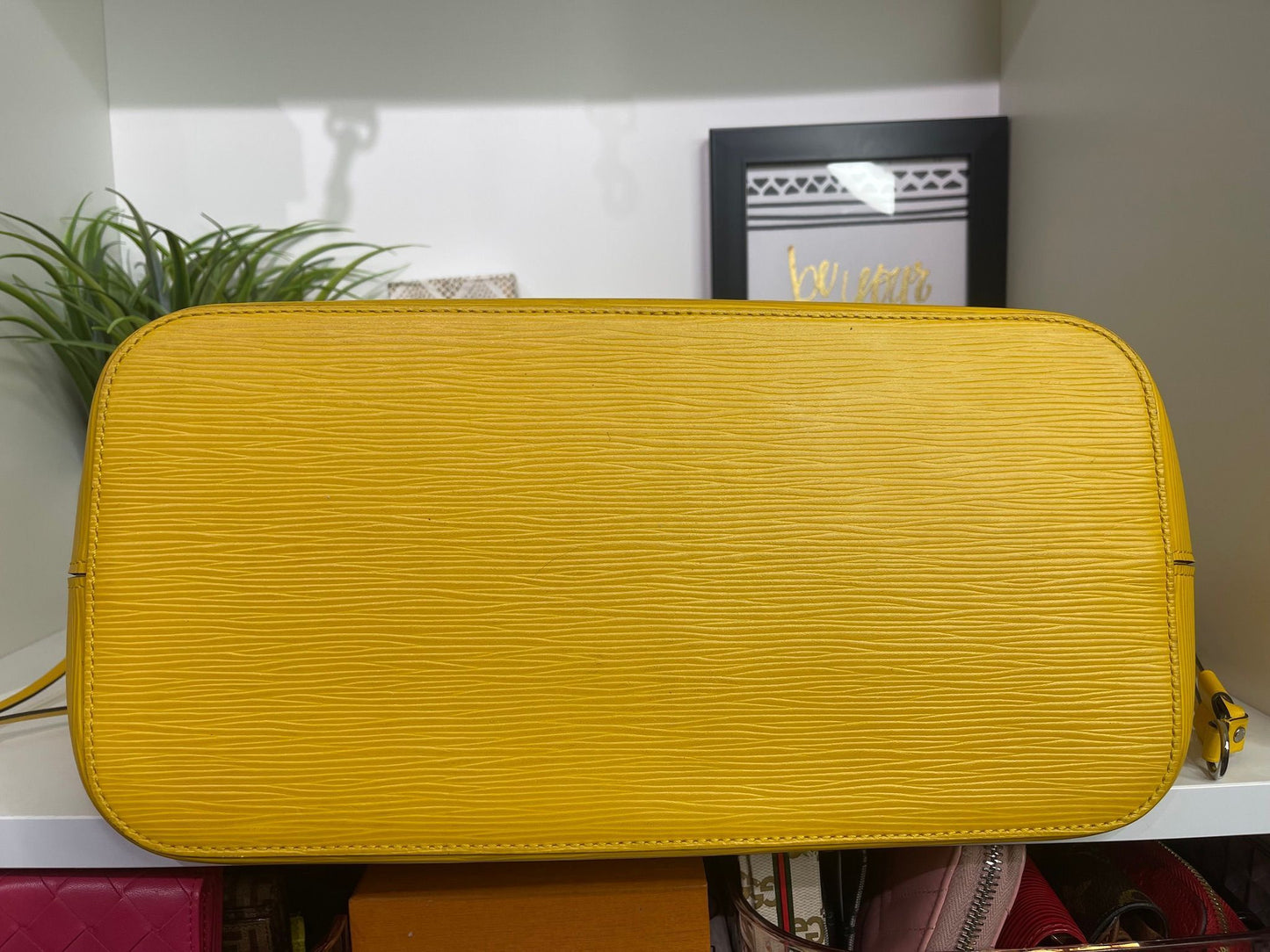 89. Louis Vuitton Yellow Epi Neverfull MM