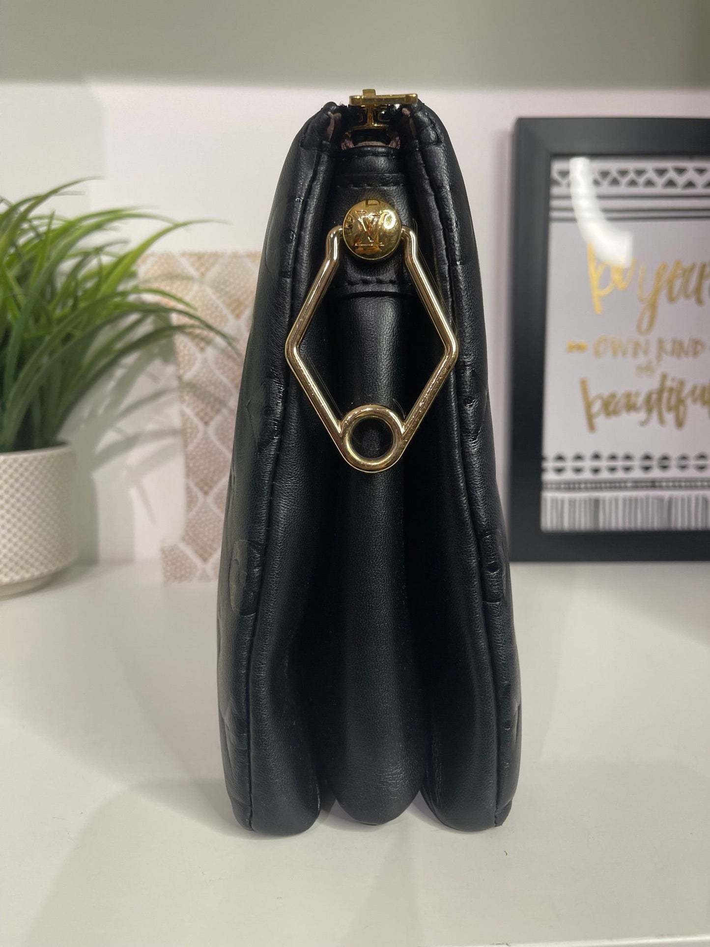 24. Louis Vuitton Black Coussin PM