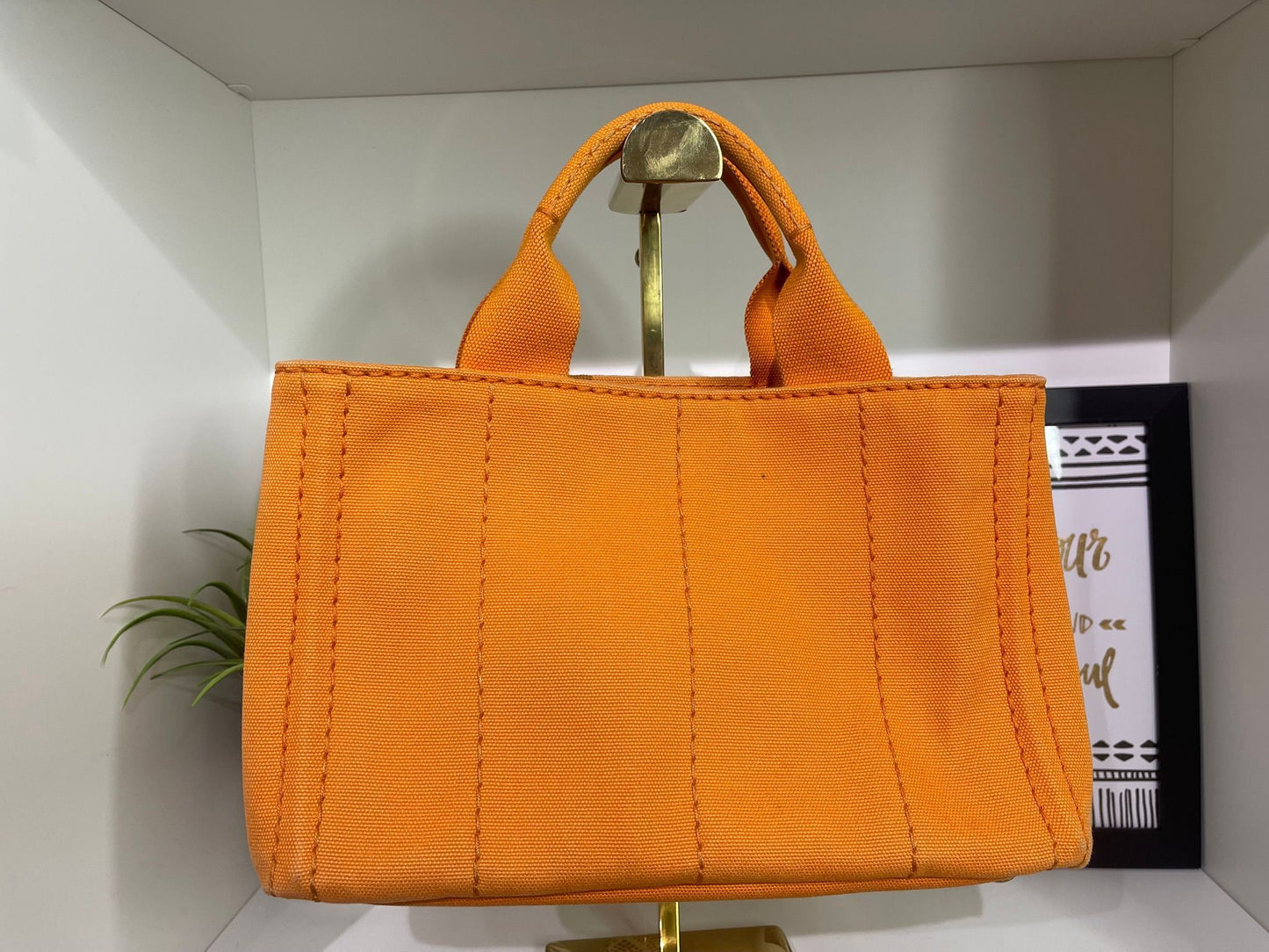 100. Prada Small Orange Canapa