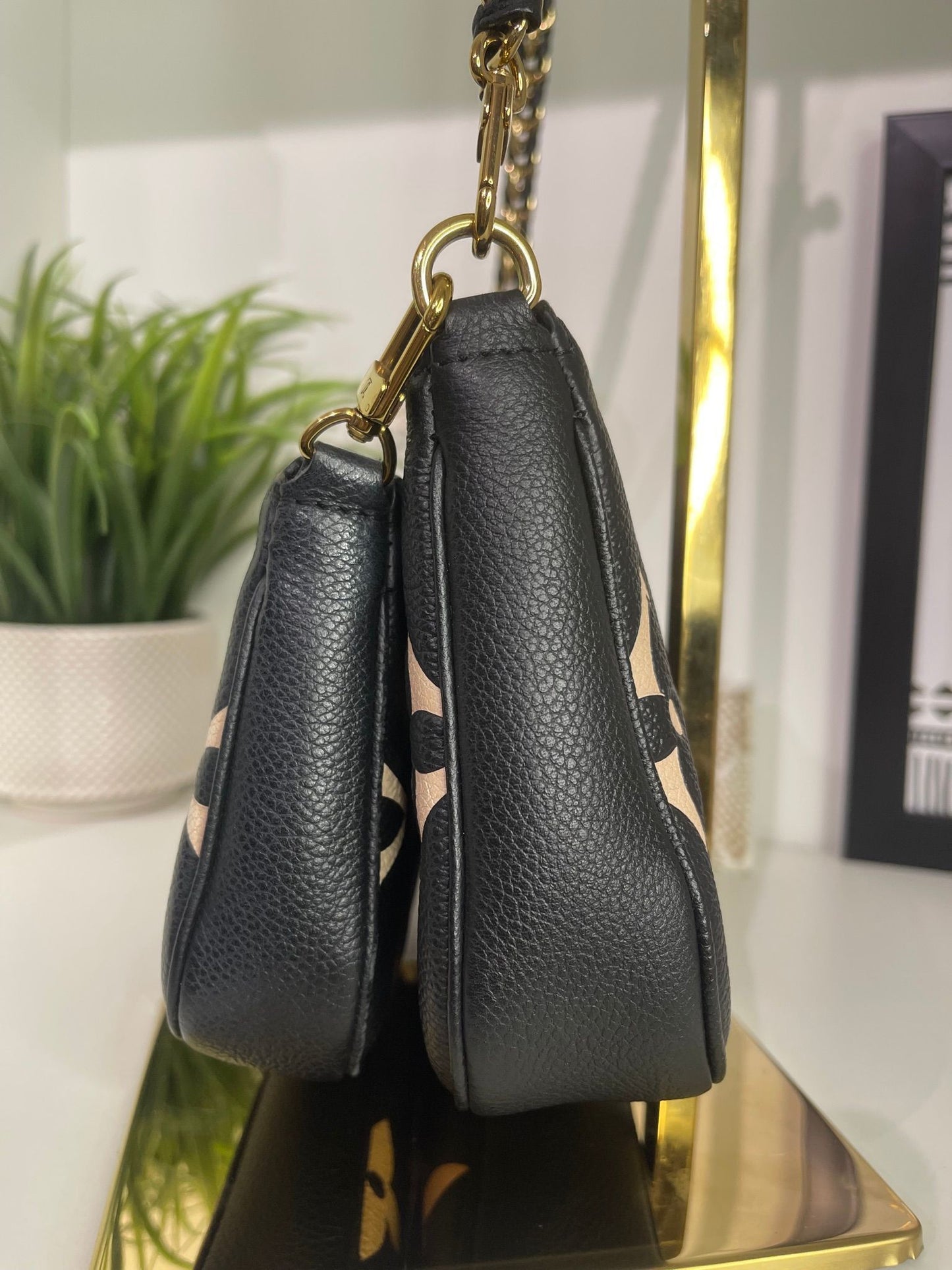 95. Louis Vuitton Multi Bicolor Pouchette