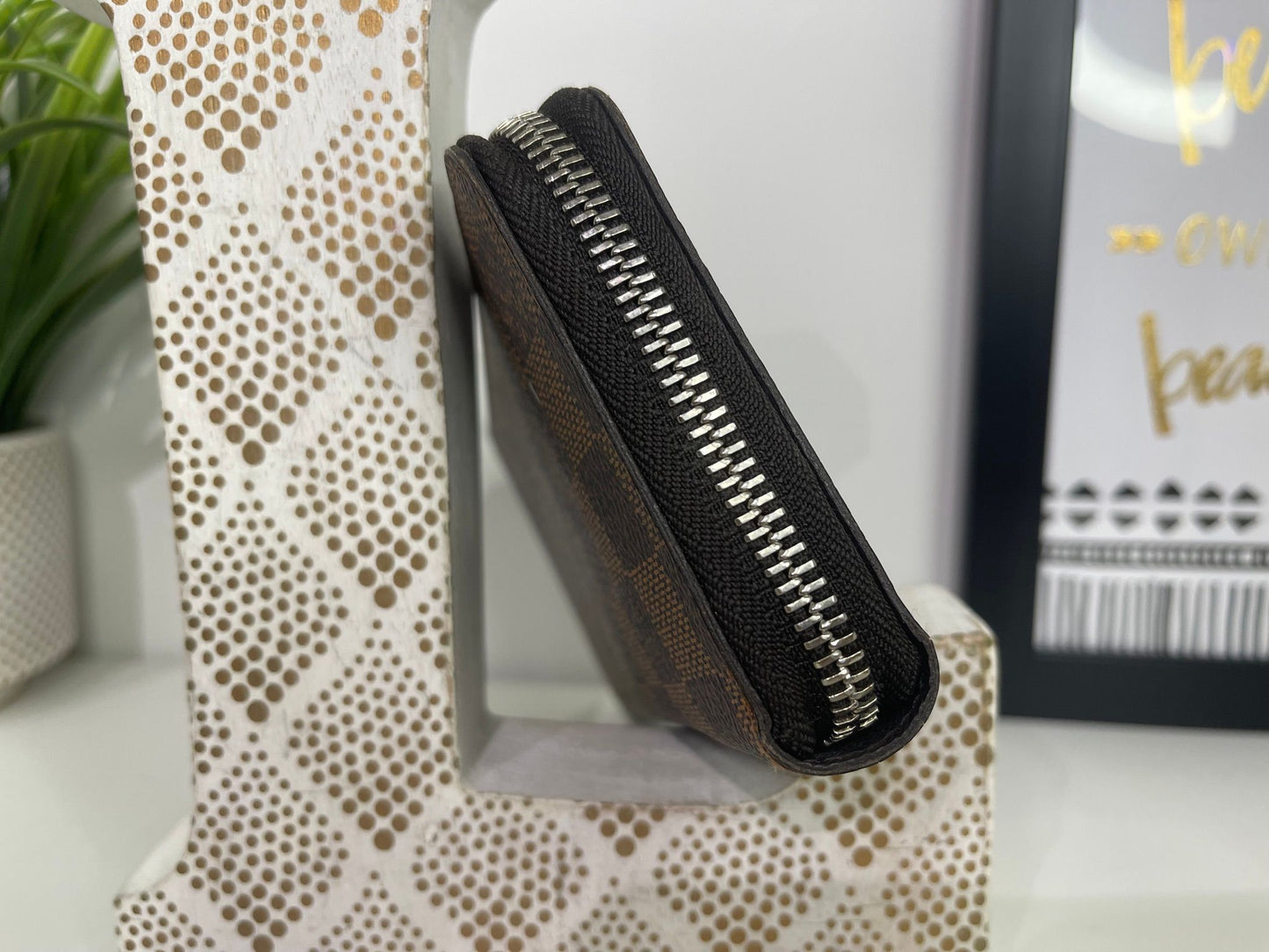 43. Louis Vuitton Damier Ebene Zippy Wallet