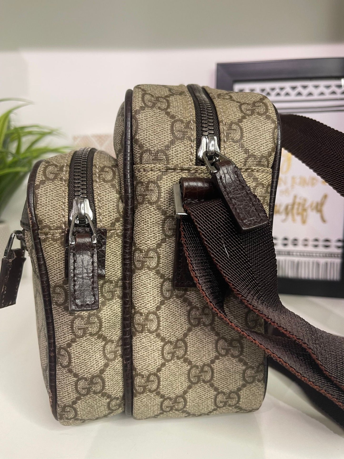49. Gucci Supreme Crossbody Camera Bag