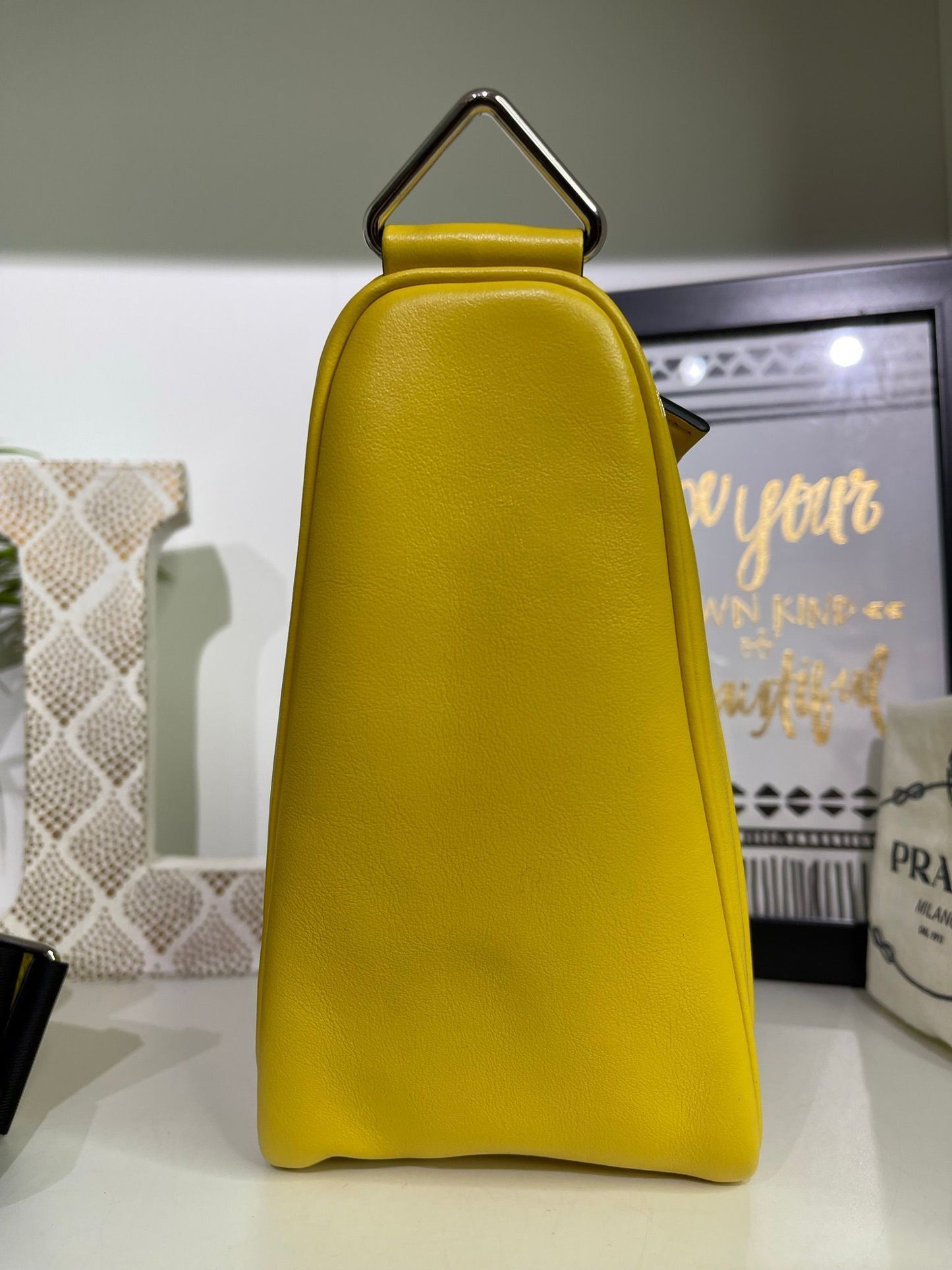 28. Prada Yellow Logo Triangle Crossbody