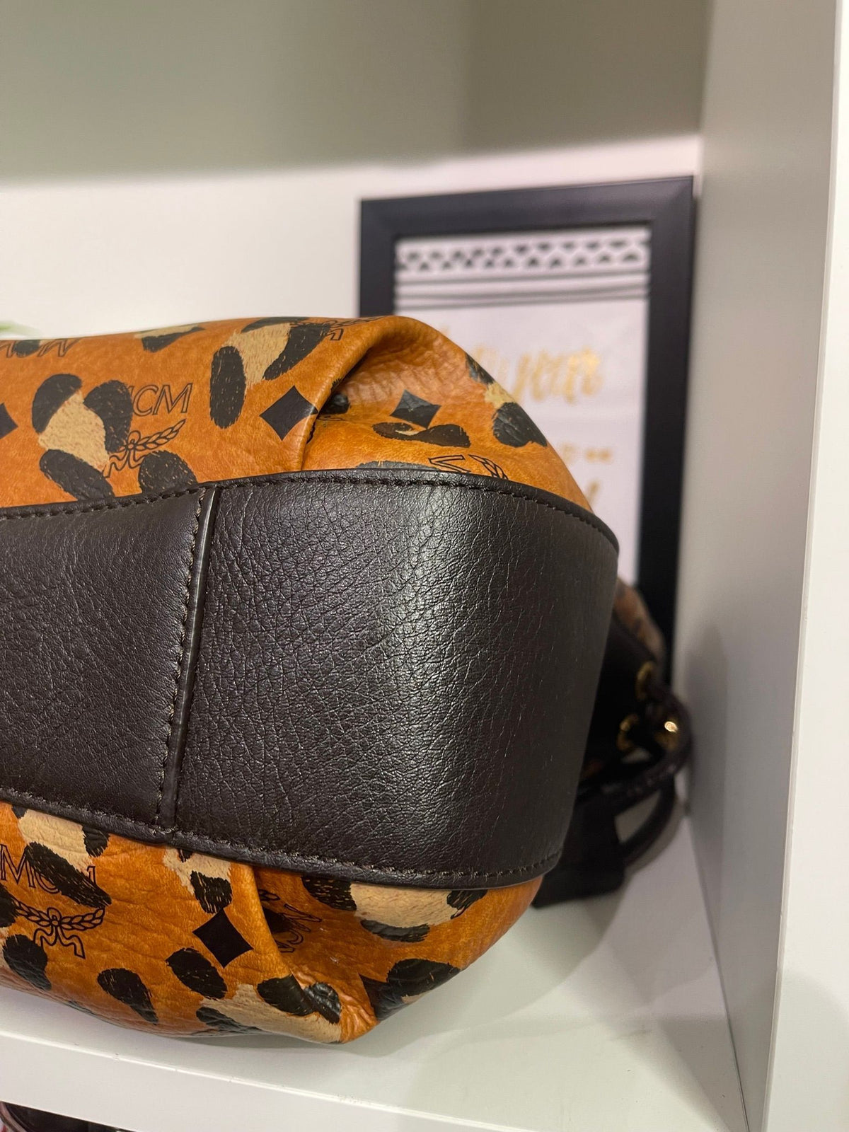 109. MCM Visetos Leopard Print Draw String Shoulder Bag