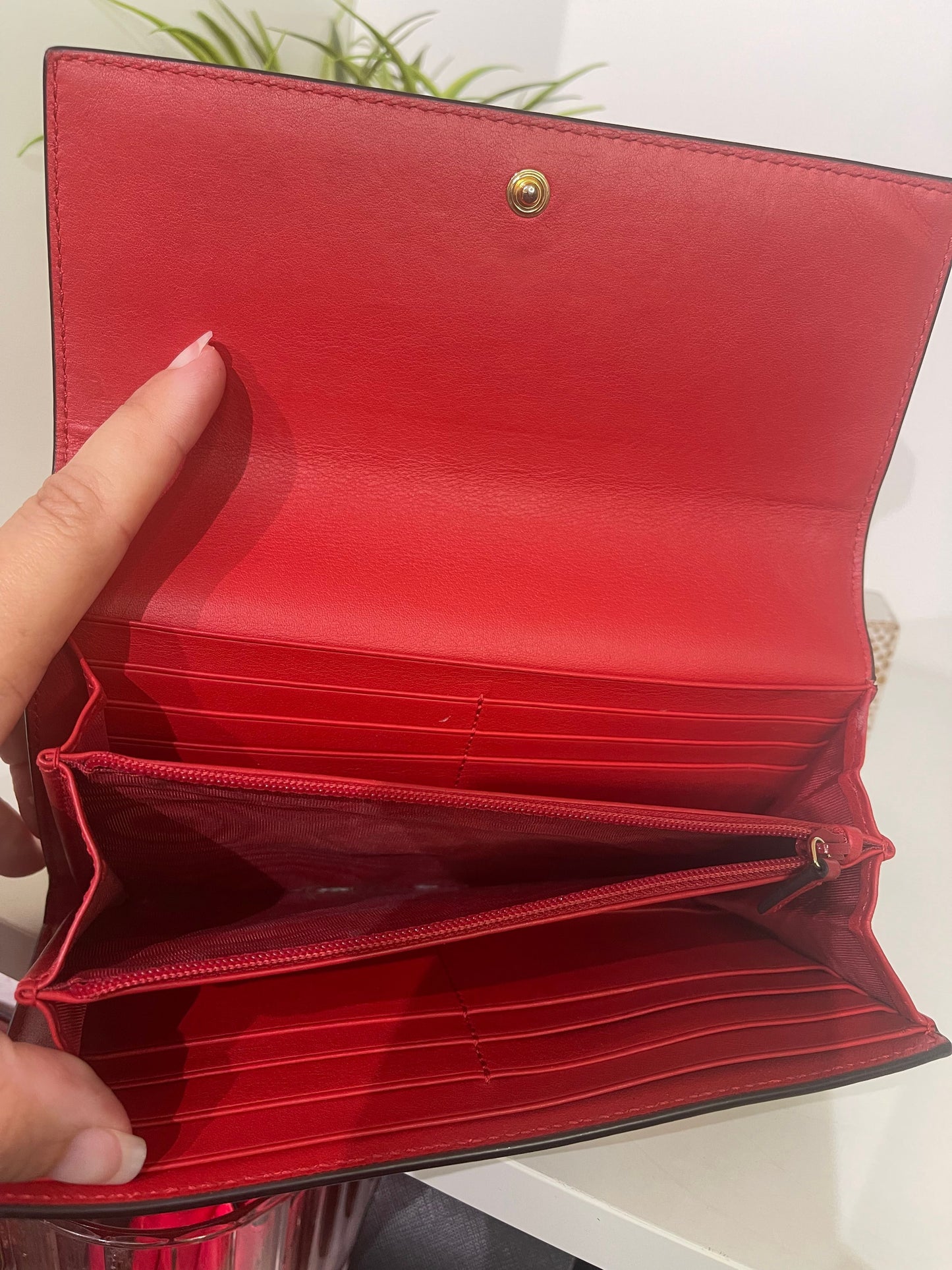 14. Gucci Supreme Apple Wallet