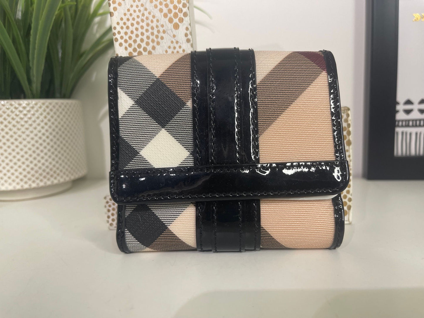67. Burberry Compact Wallet