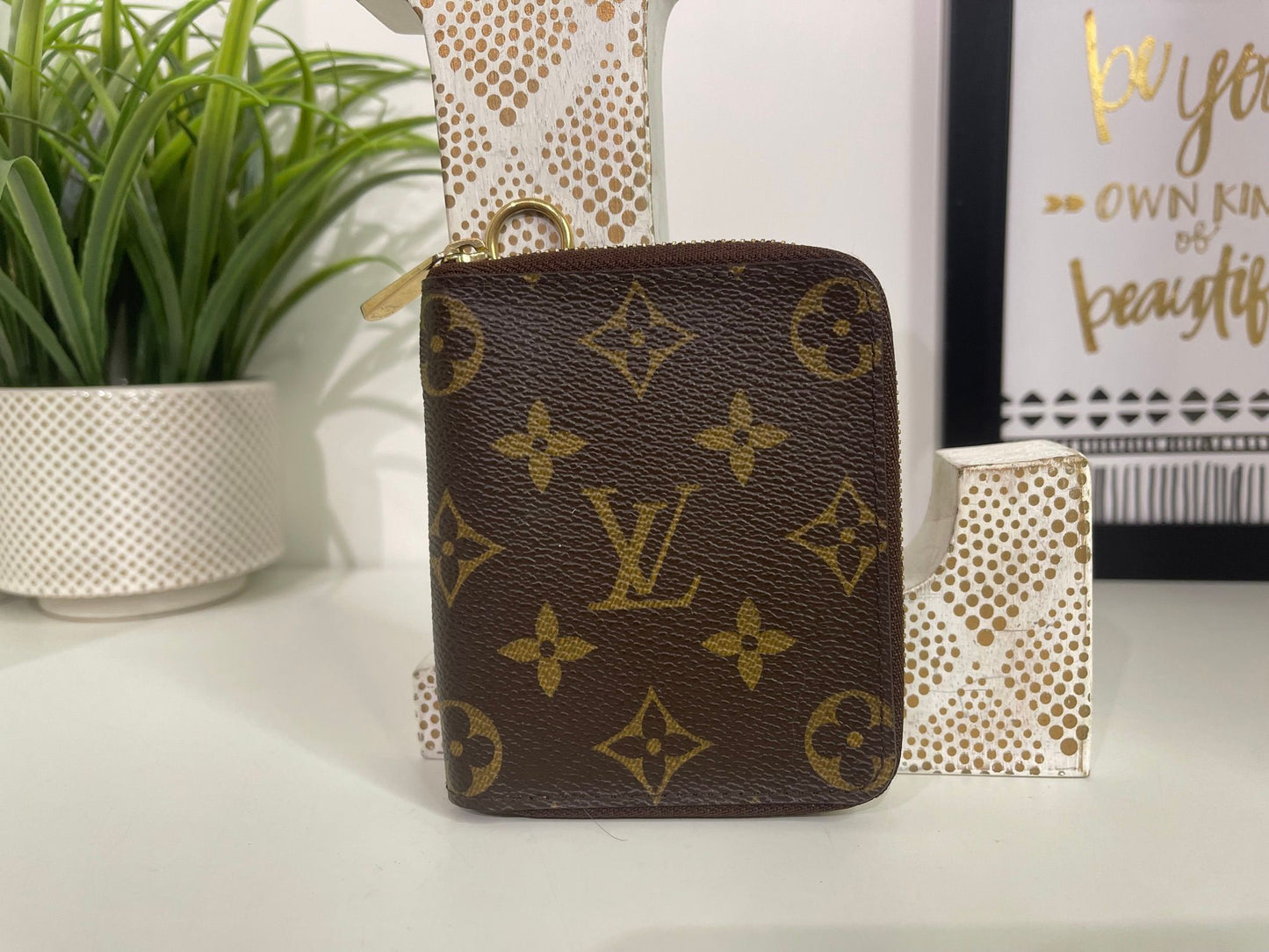 12. Louis Vuitton Monogram Zippy Card Holder