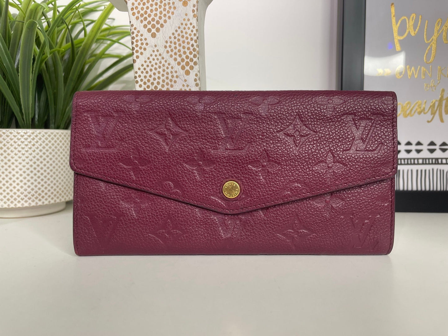 112. Louis Vuitton Aurore Monogram Empreinte Leather Curieuse Wallet