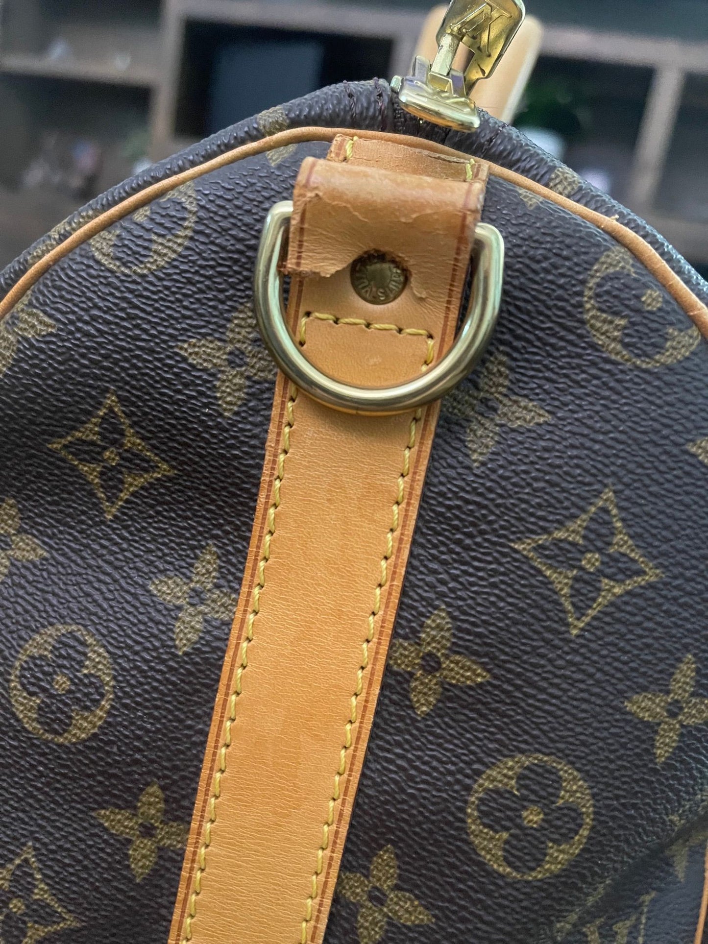 38. Louis Vuitton KeepAll 50 Bandolier (NO STRAP)