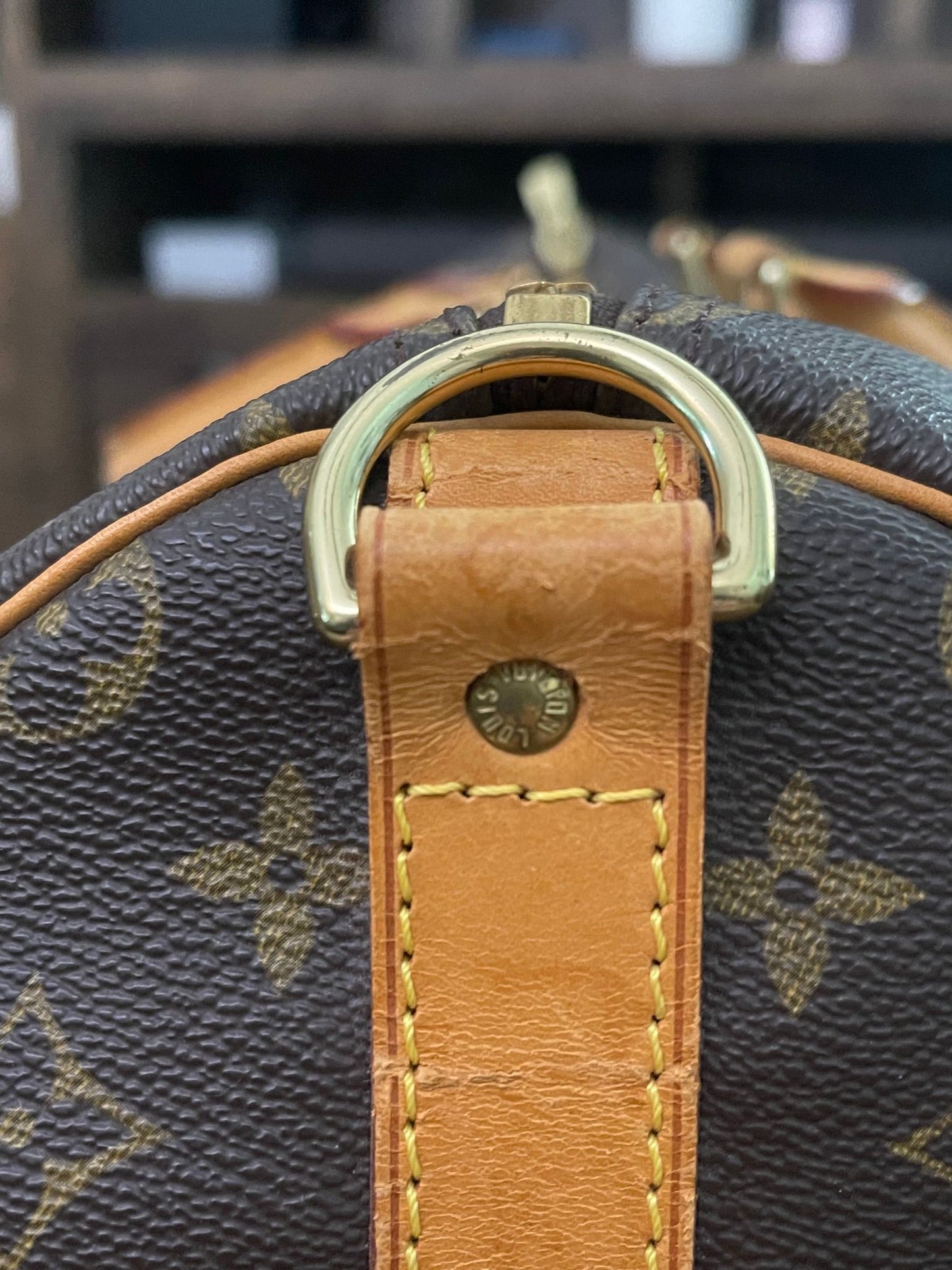 38. Louis Vuitton KeepAll 50 Bandolier (NO STRAP)