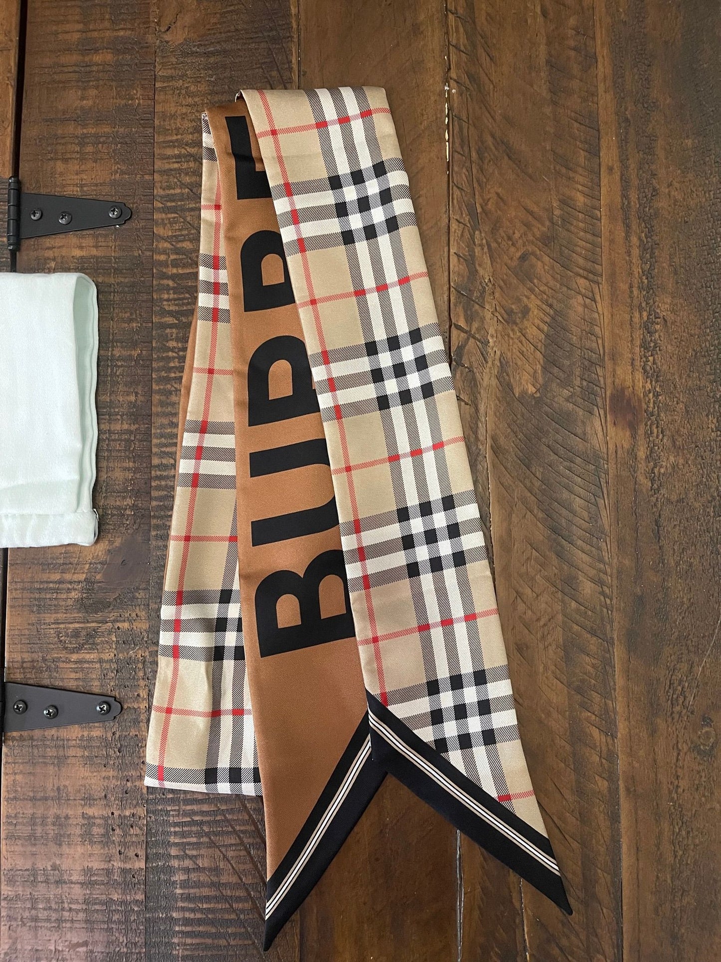 100. Burberry Silk Scarf