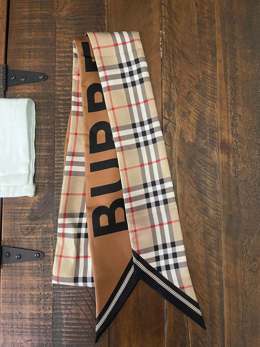 100. Burberry Silk Scarf