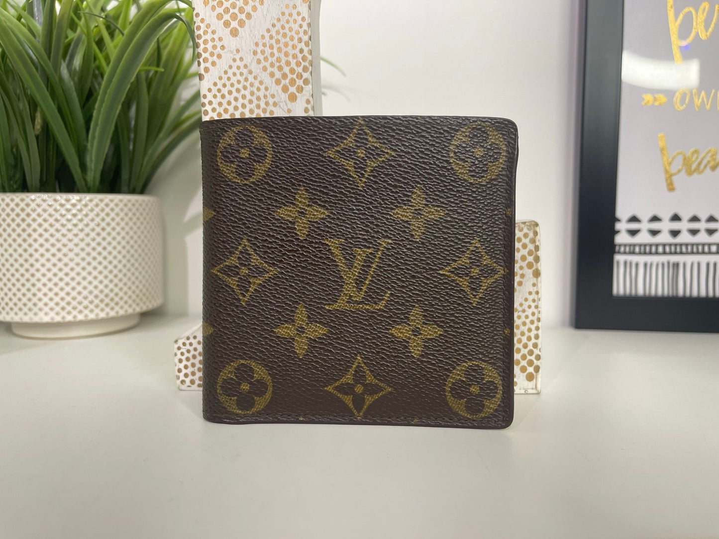 86. Louis Vuitton Monogram Bifold Wallet