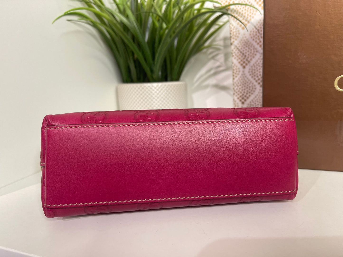 121. Gucci Fuscia Cosmetic Bag