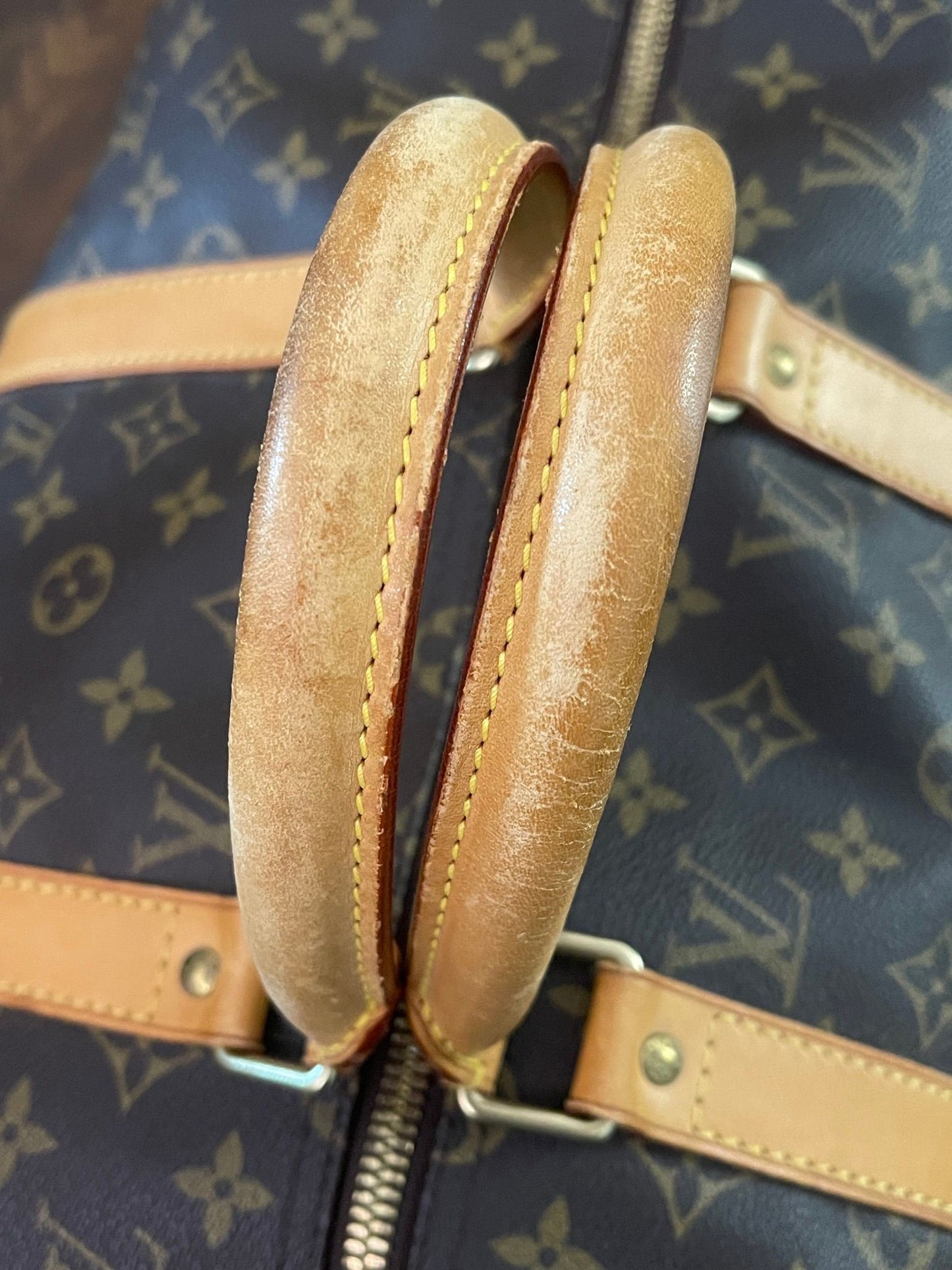 38. Louis Vuitton KeepAll 50 Bandolier (NO STRAP)