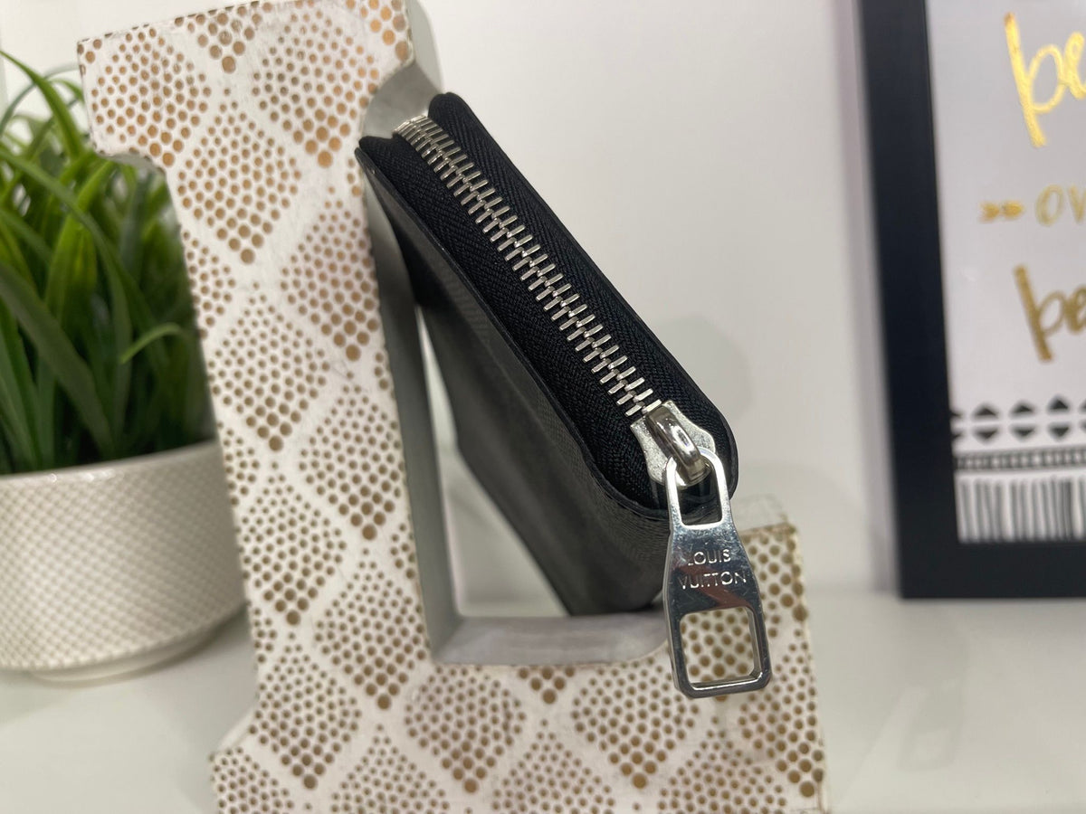 50. Louis Vuitton Damier Graphite Zippy Wallet