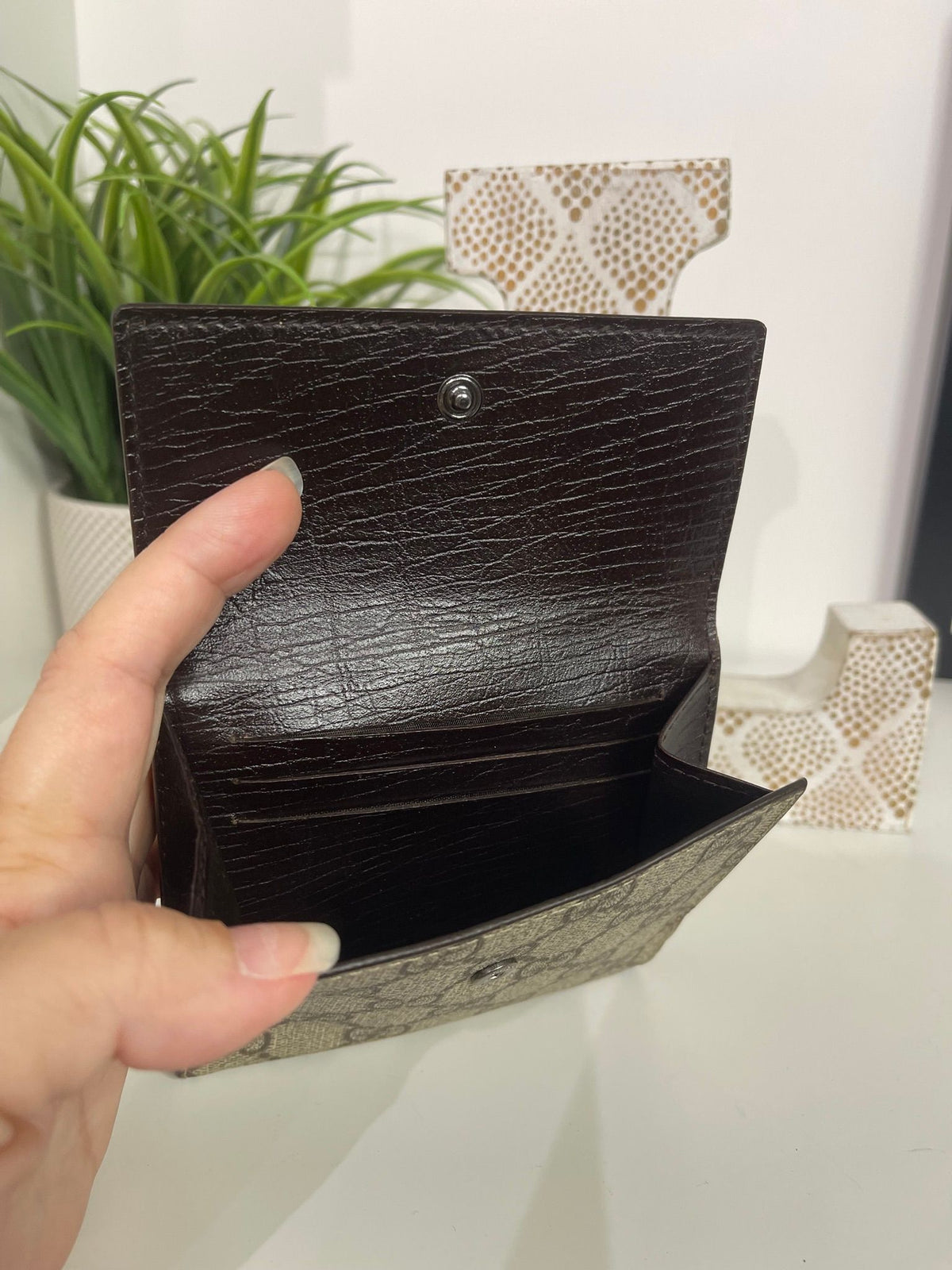 86. Gucci Supreme Compact Wallet