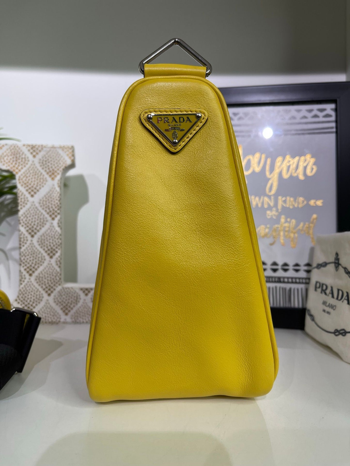 28. Prada Yellow Logo Triangle Crossbody