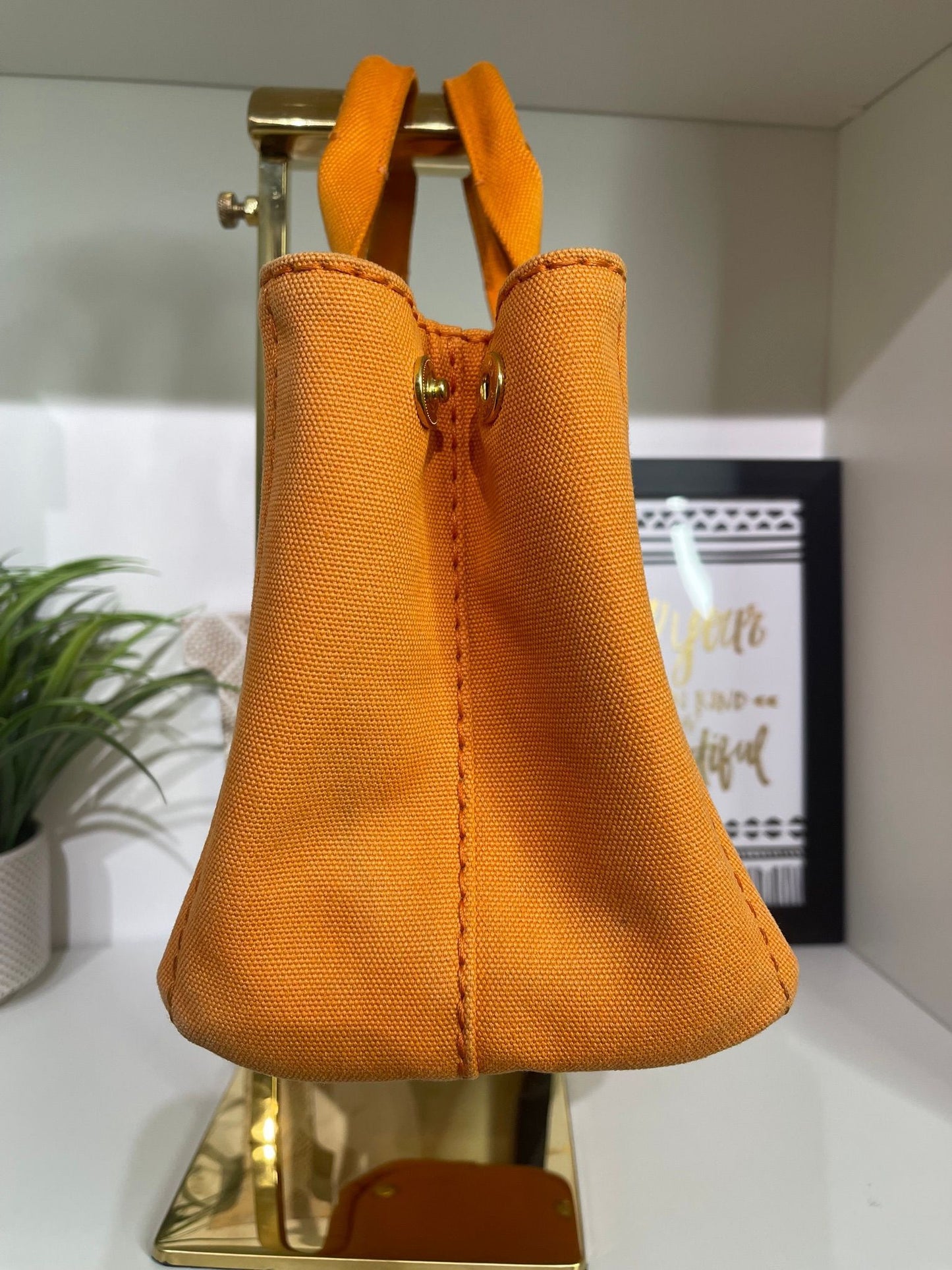 100. Prada Small Orange Canapa