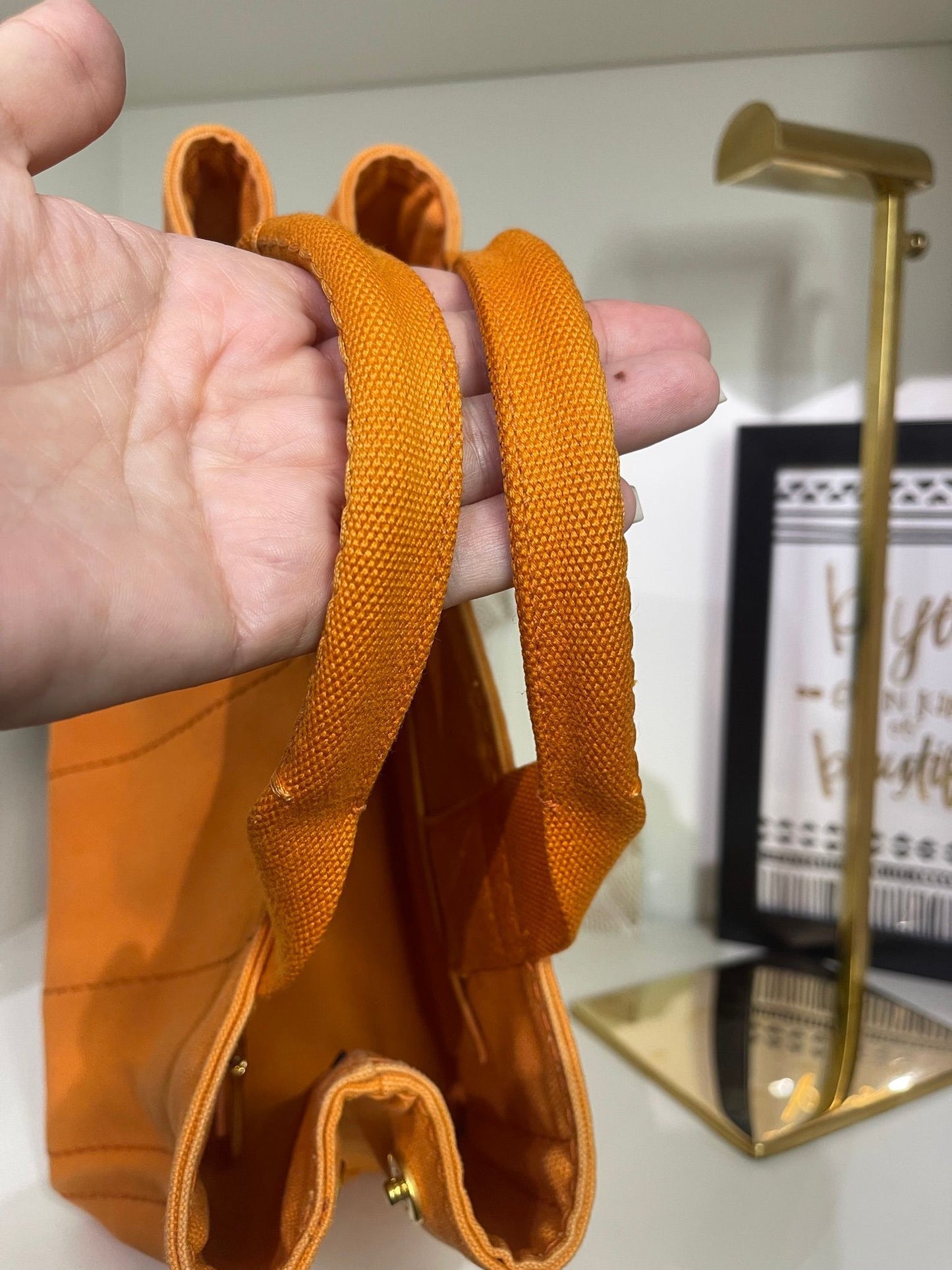 100. Prada Small Orange Canapa
