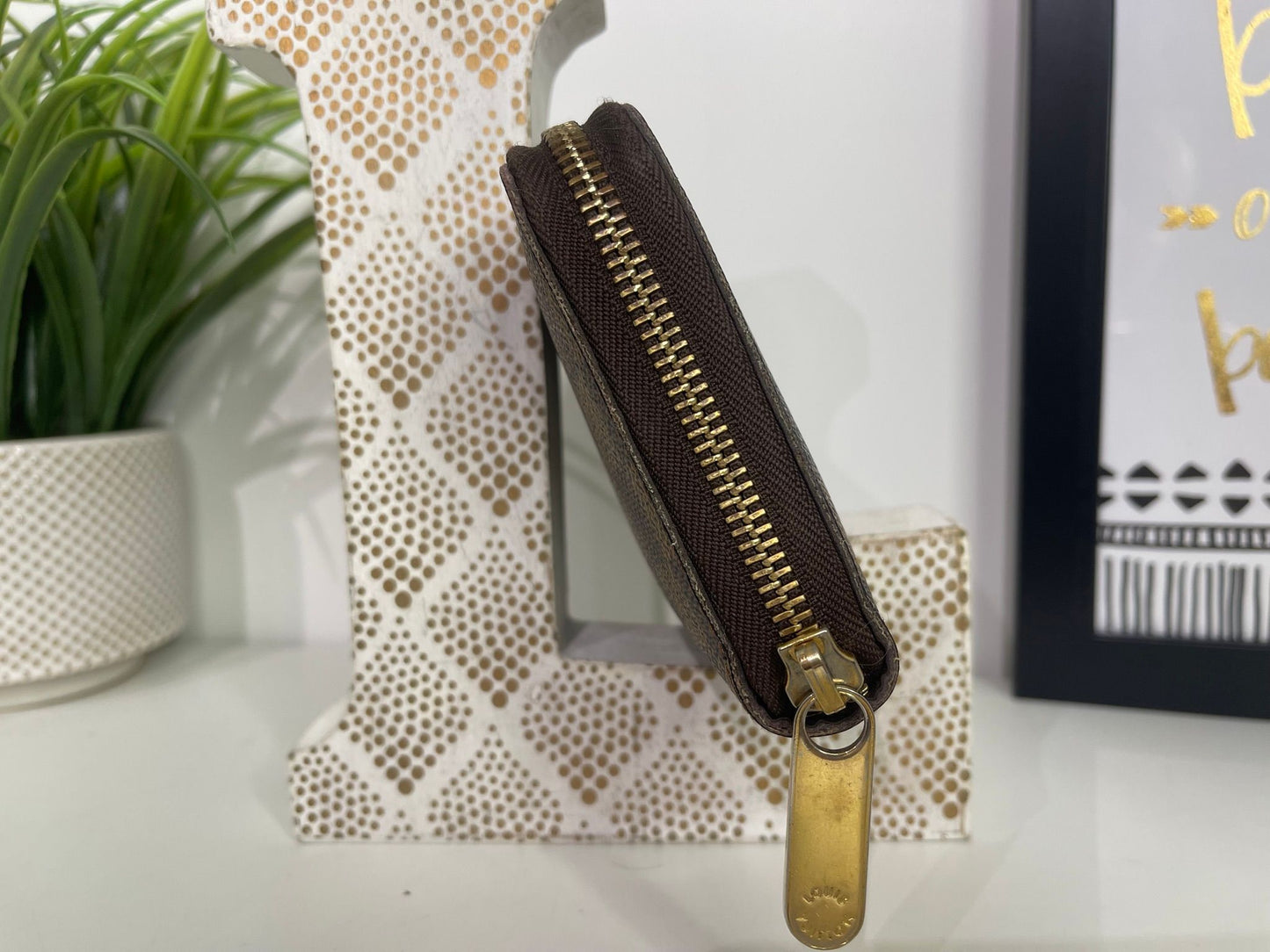 95. Louis Vuitton Damier Ebene Zippy Wallet